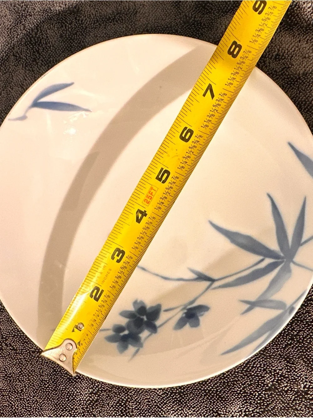 White Porcelain Dinner Plate with Blue Floral Accent